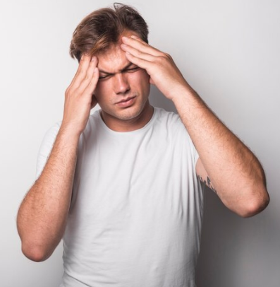 Man Suffering with Migraine
